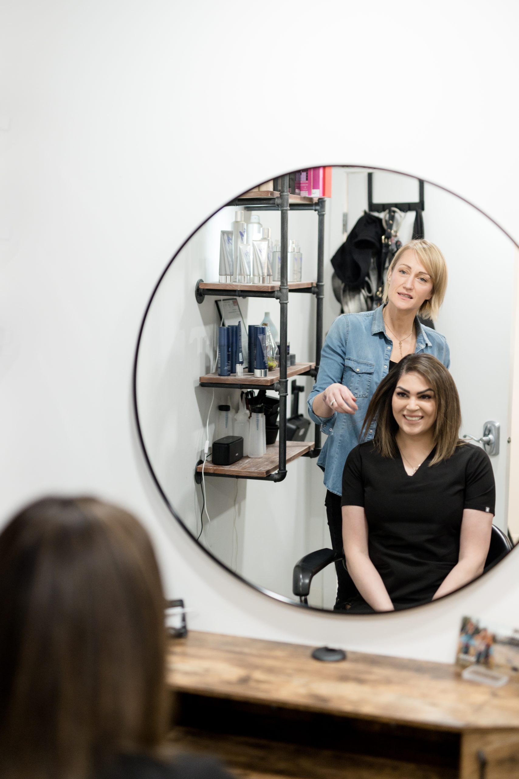 Beauty professional working inside District Studios